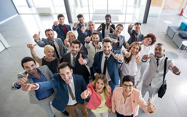 54231993 - portrait of thumb up smiling business people