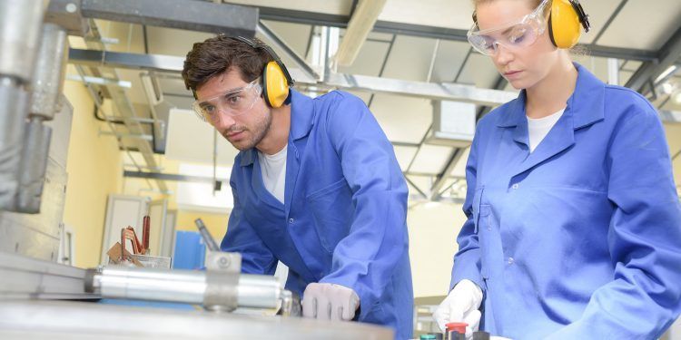 Male and female factory workers