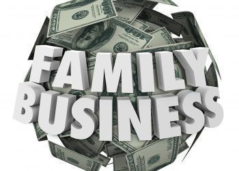 Family Business 3d words on ball or sphere of money in hundred dollar bills to illustrate a company started or launched by members of families