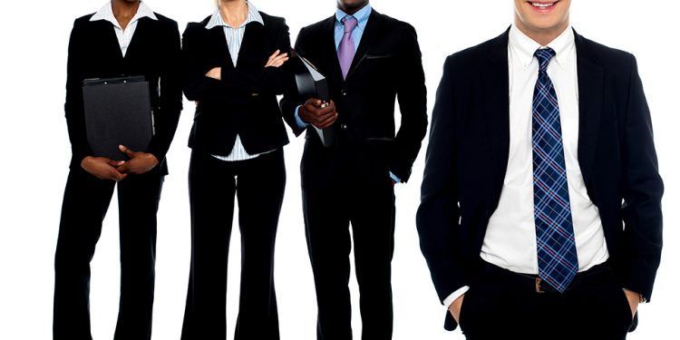 Group of business people smiling isolated over white background