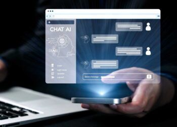 A modern technology scene where a user interacts with a mobile chat AI application, emphasizing the future of communication and digital conversation experiences. Qubit