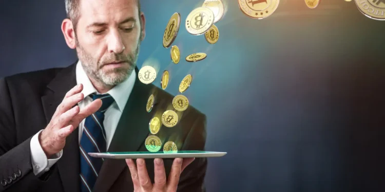 Bitcoin saliendo de una tablet